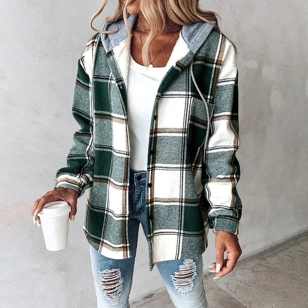Green and white plaid flannel hooded shacket with a soft sherpa lining and relaxed, button-up fit.