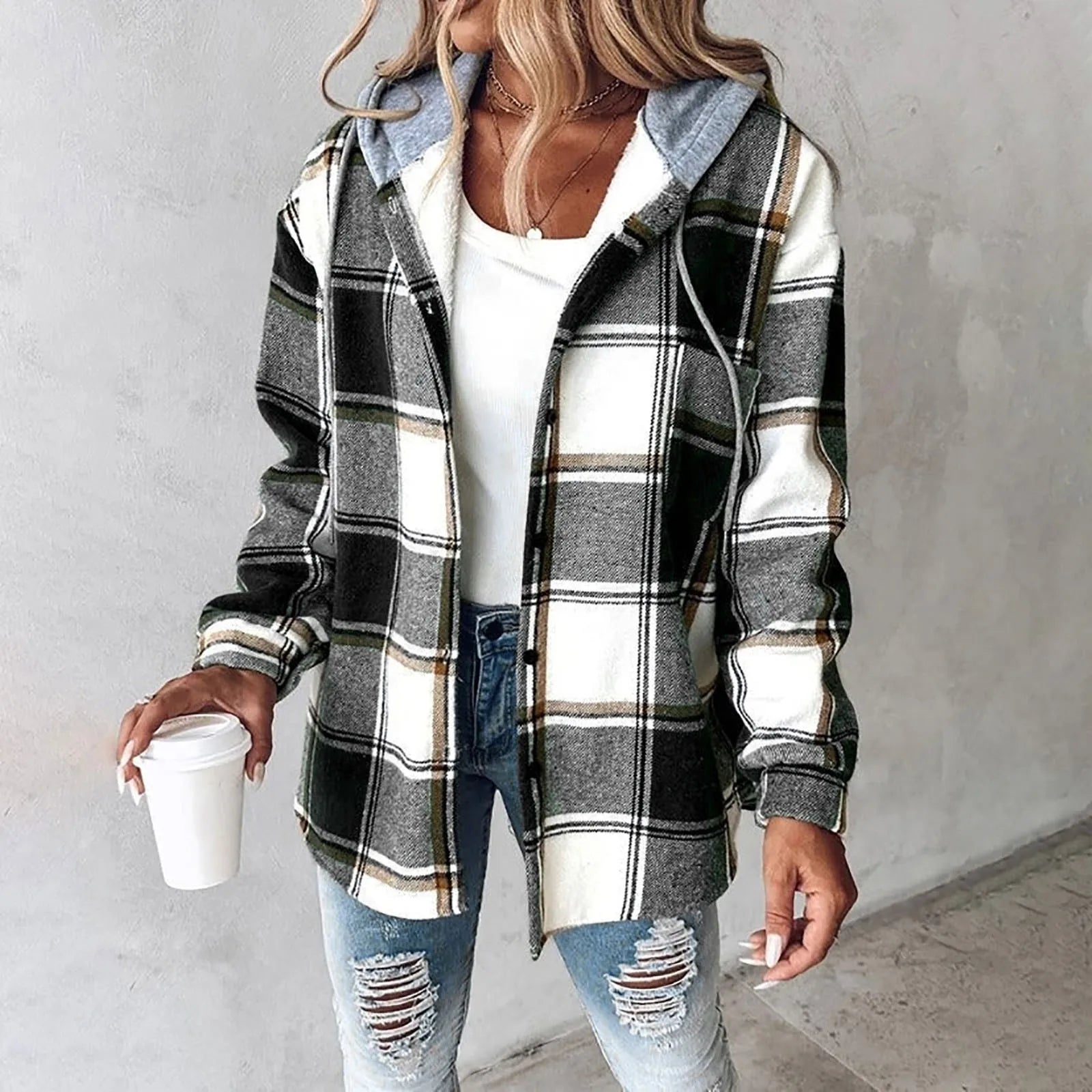 Green and white plaid flannel shacket with a grey drawstring hood, sherpa lining, and a relaxed button-up fit.