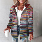 Multi-colored striped hooded shacket in soft flannel with a button-up front, drawstring hood, and relaxed fit.