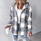 Grey and white plaid flannel hooded shacket with a soft sherpa lining and relaxed button-up fit.