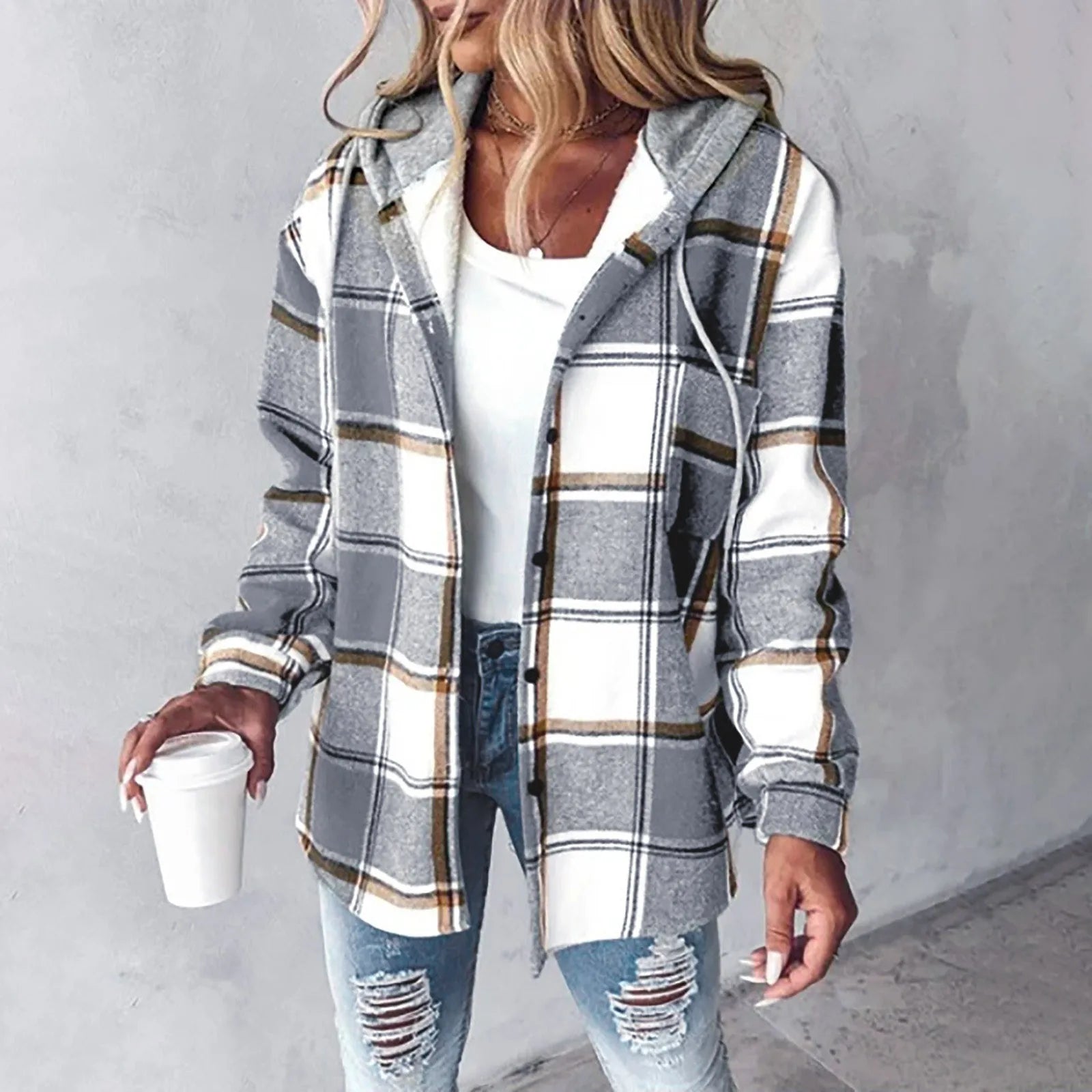 Grey and white plaid flannel hooded shacket with a soft sherpa lining and relaxed button-up fit.