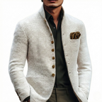Off-white textured weave blazer cardigan with a stand collar, single-breasted button front, and pocket square detail.