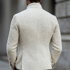 Beige textured weave blazer cardigan with a structured stand collar and tailored fit, viewed from the back.