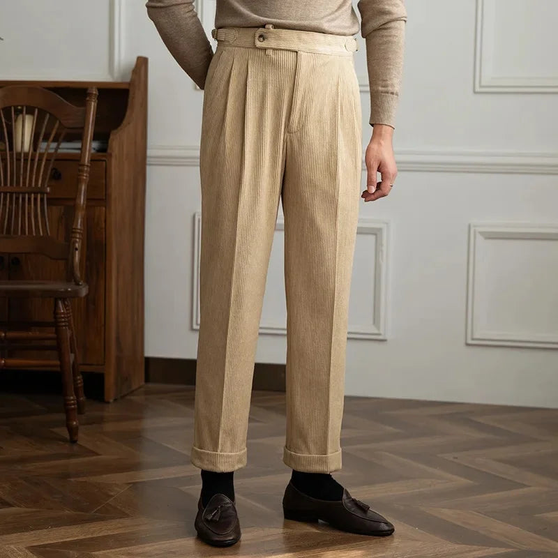 Beige high-waisted pleated corduroy pants with side adjusters and turn-up cuffs
