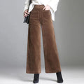 Brown wide-leg corduroy pants shown from the front with high waist and patch pockets