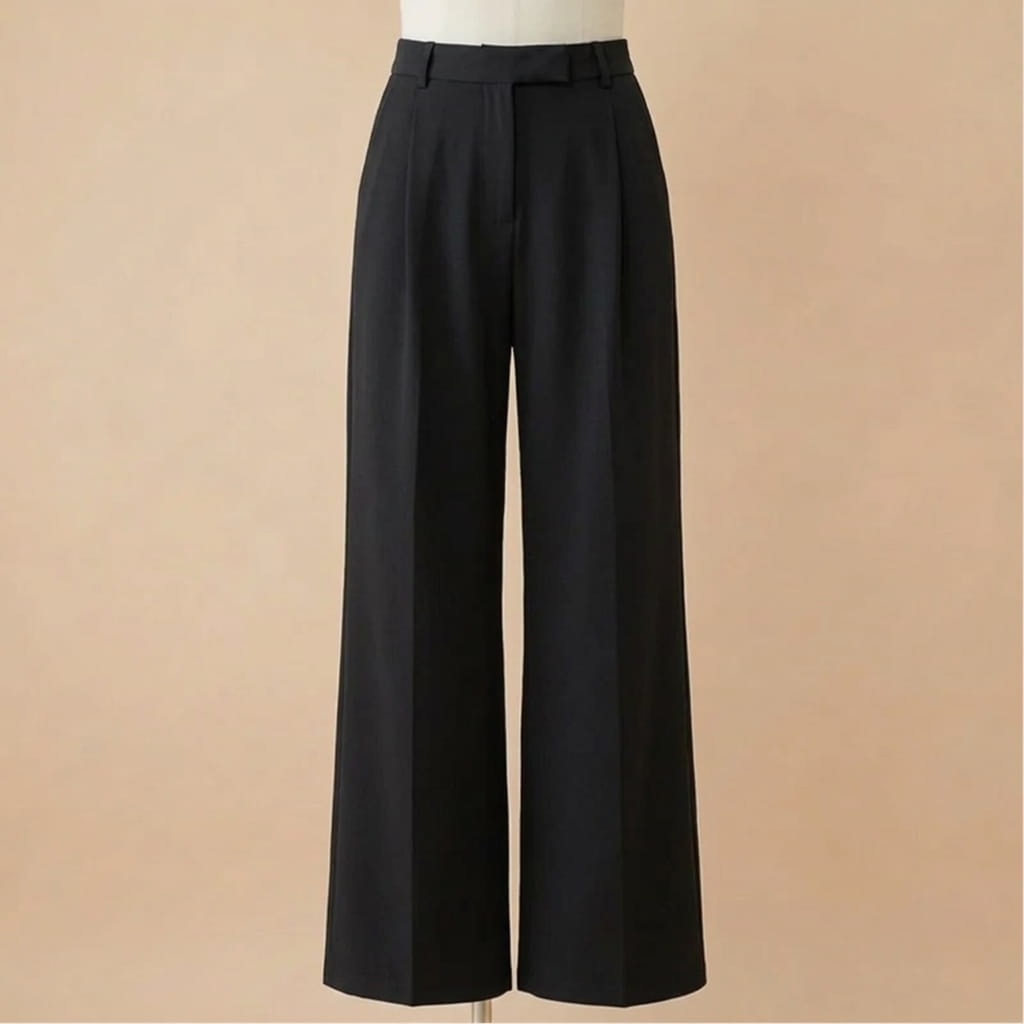 Front product view on a mannequin of solid black high-waisted wide-leg wool trousers with a pleated front and pressed creases.