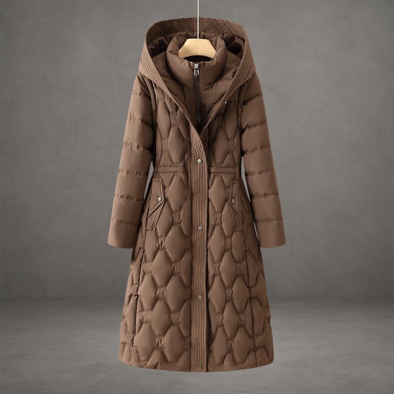 Brown longline puffer coat with an insulated hood, geometric quilted pattern, and snap-button front closure.