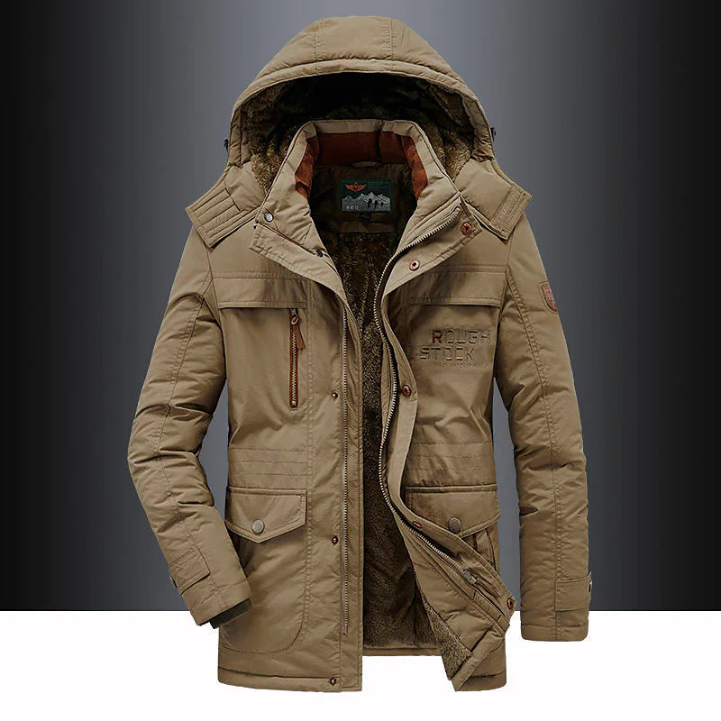 Brown insulated utility winter jacket with a faux-fur lined hood, multiple zip and flap pockets, and a durable shell.