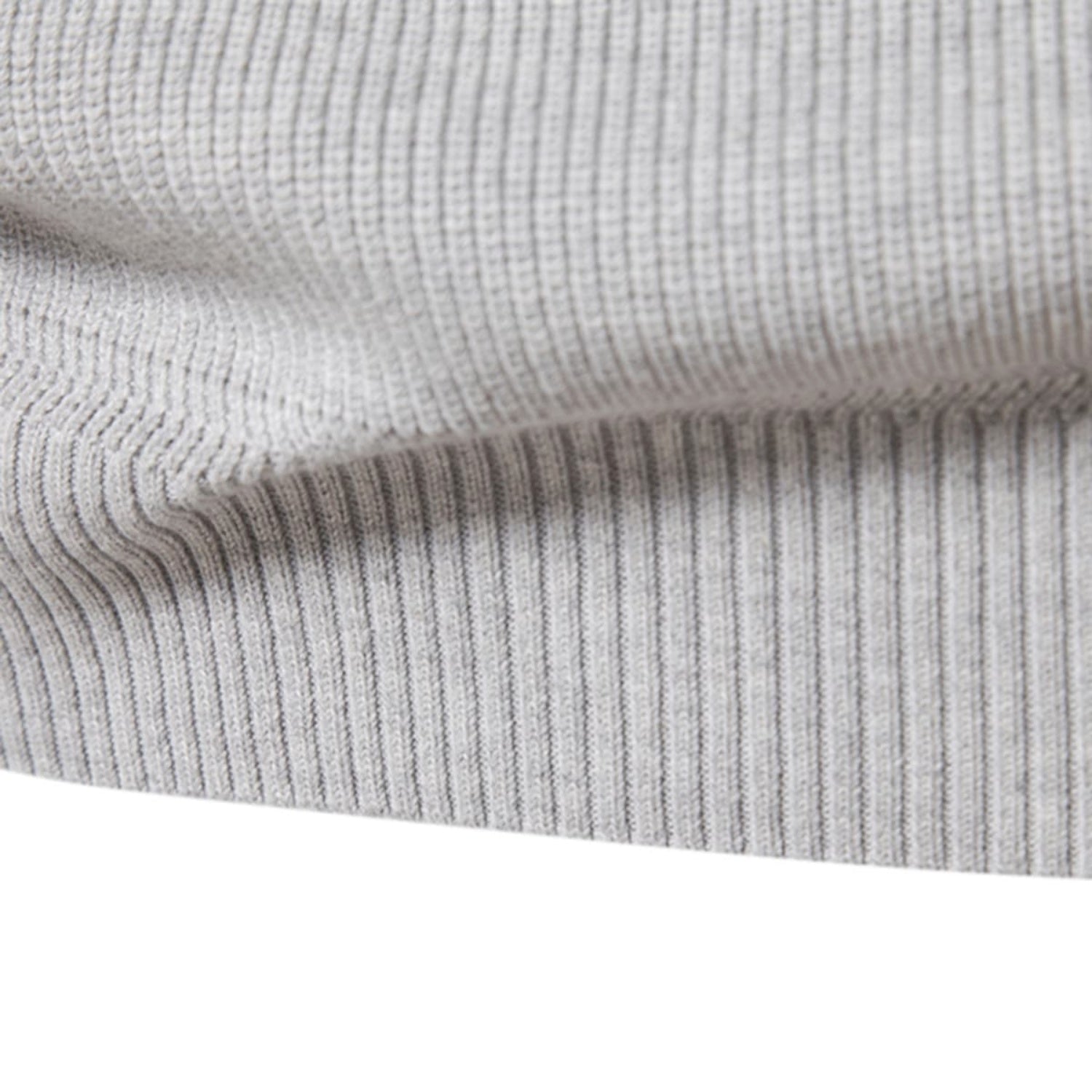 Close-up of the soft knit fabric showcasing the fine ribbed texture and premium material.