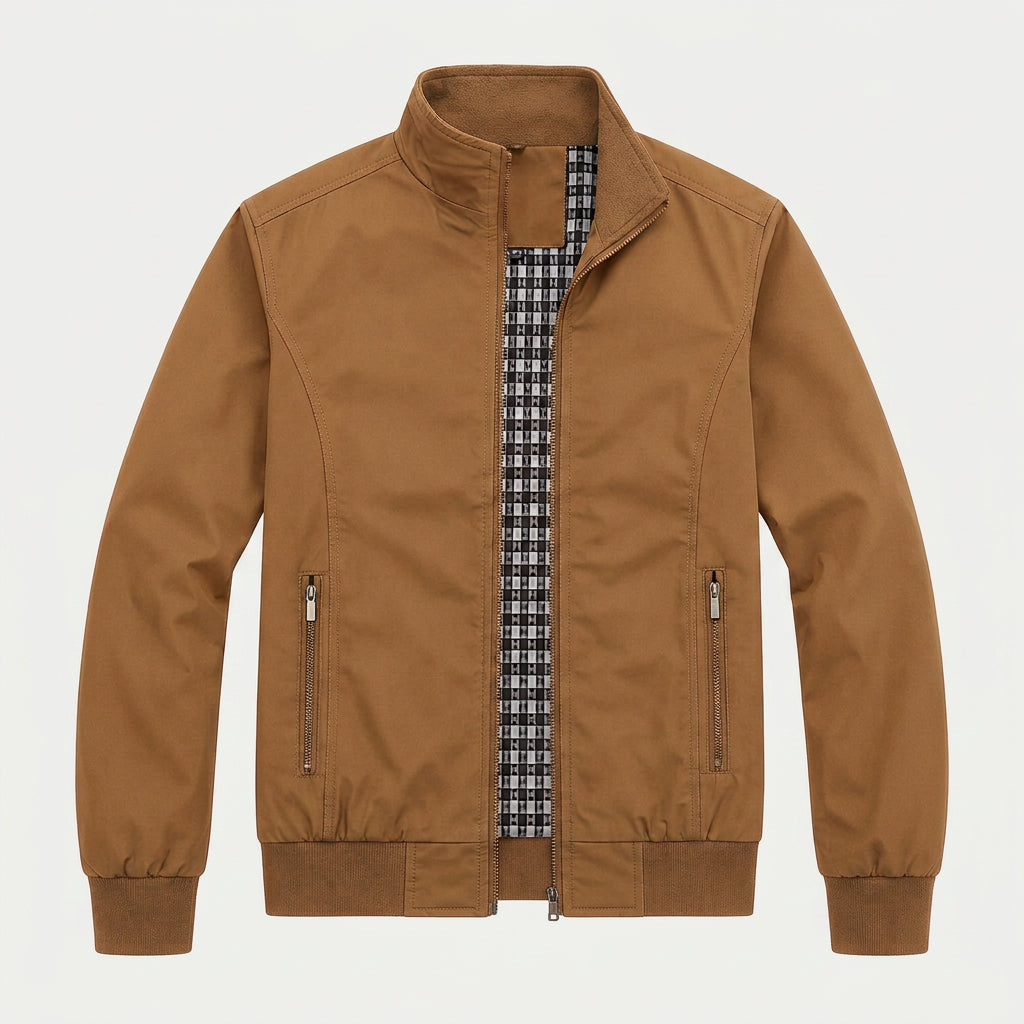 Camel brown zip-up bomber jacket with a stand collar, plaid lining, zippered pockets, and ribbed cuffs on a white background.
