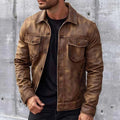 Distressed brown leather trucker jacket with a classic collar, button-up front, and dual chest flap pockets.