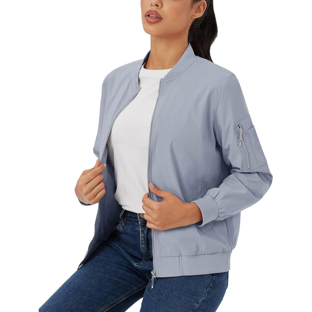 Light blue lightweight bomber jacket with a zip-up front, ribbed trim, and a functional utility sleeve pocket.