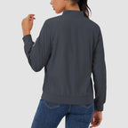 Charcoal grey lightweight bomber jacket with a zip sleeve pocket, ribbed trim, and a smooth, water-resistant finish.