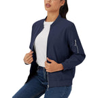Navy blue lightweight bomber jacket with a zip-up front, ribbed trim, and a utility sleeve pocket worn over denim.