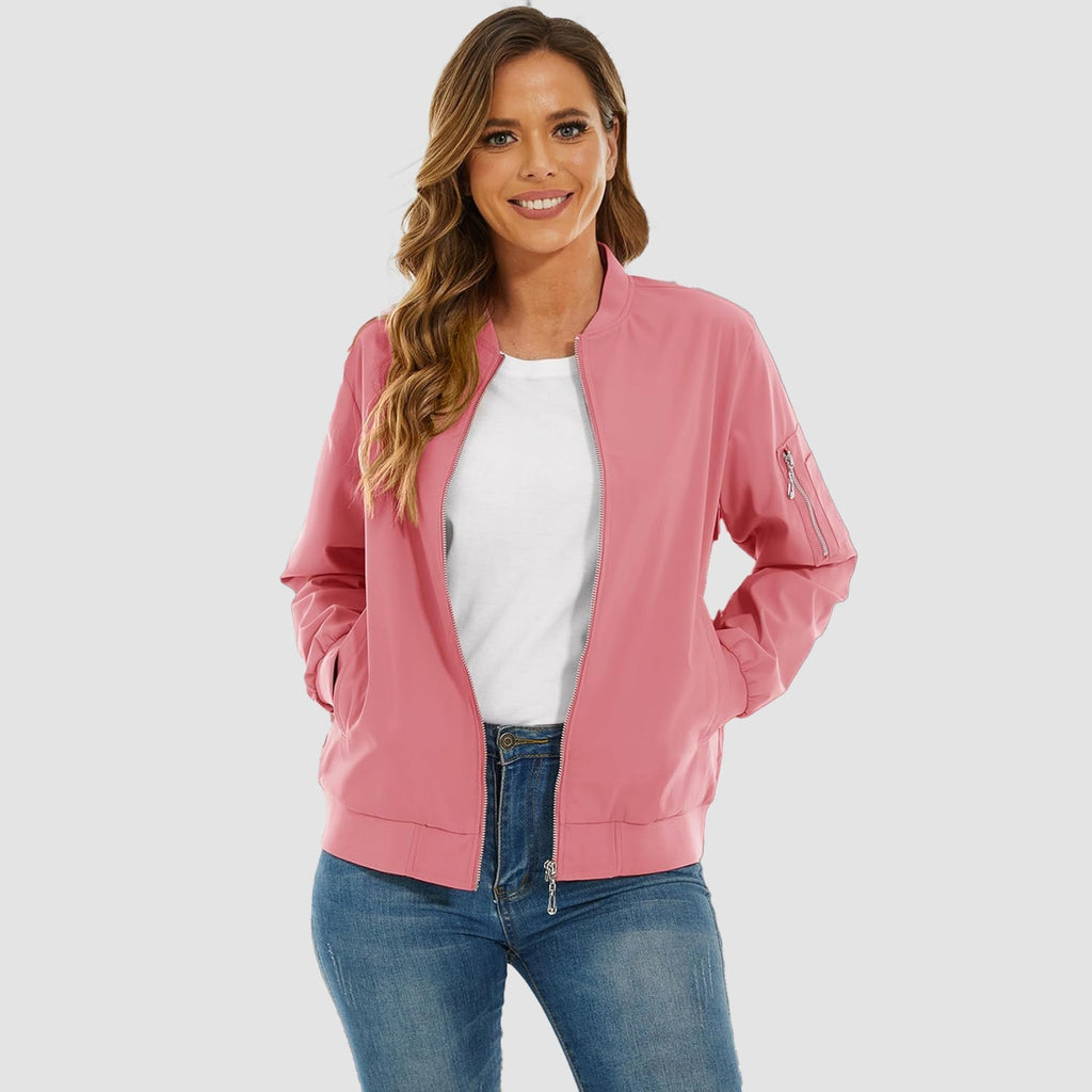 Pink lightweight bomber jacket in water-resistant polyester with ribbed trim, zip sleeve pocket, and a relaxed fit.