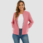 Pink lightweight bomber jacket in water-resistant polyester with ribbed trim, zip sleeve pocket, and a relaxed fit.