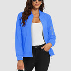 Bright blue lightweight bomber jacket in water-resistant polyester with a zip sleeve pocket and ribbed trim.