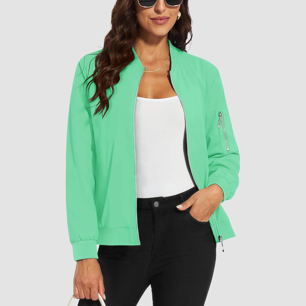 Light green lightweight bomber jacket in water-resistant polyester with a zip sleeve pocket and ribbed trim.