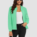Light green lightweight bomber jacket in water-resistant polyester with a zip sleeve pocket and ribbed trim.