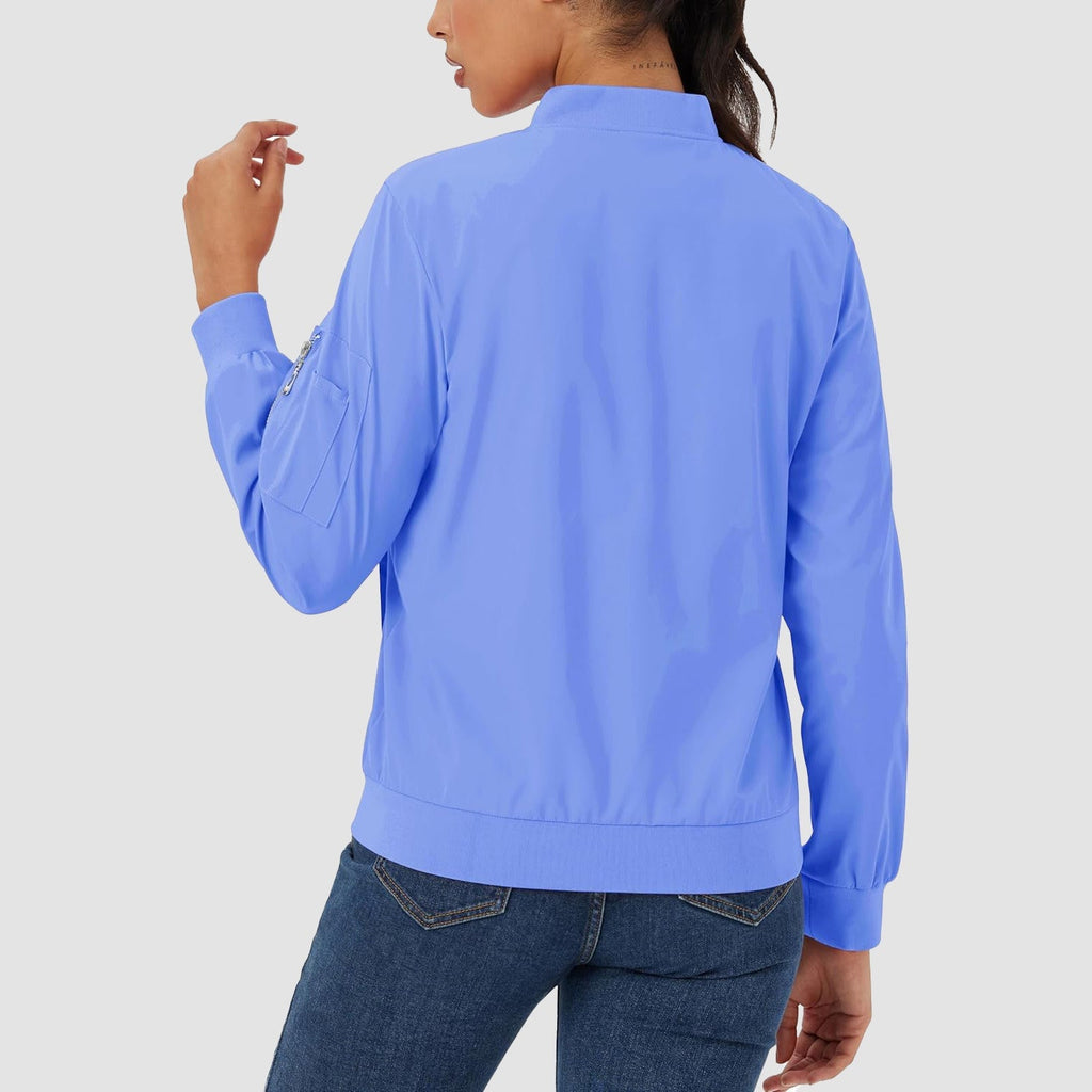 Lightweight blue bomber jacket in water-resistant polyester with a zip sleeve pocket, ribbed trim, and a classic fit.