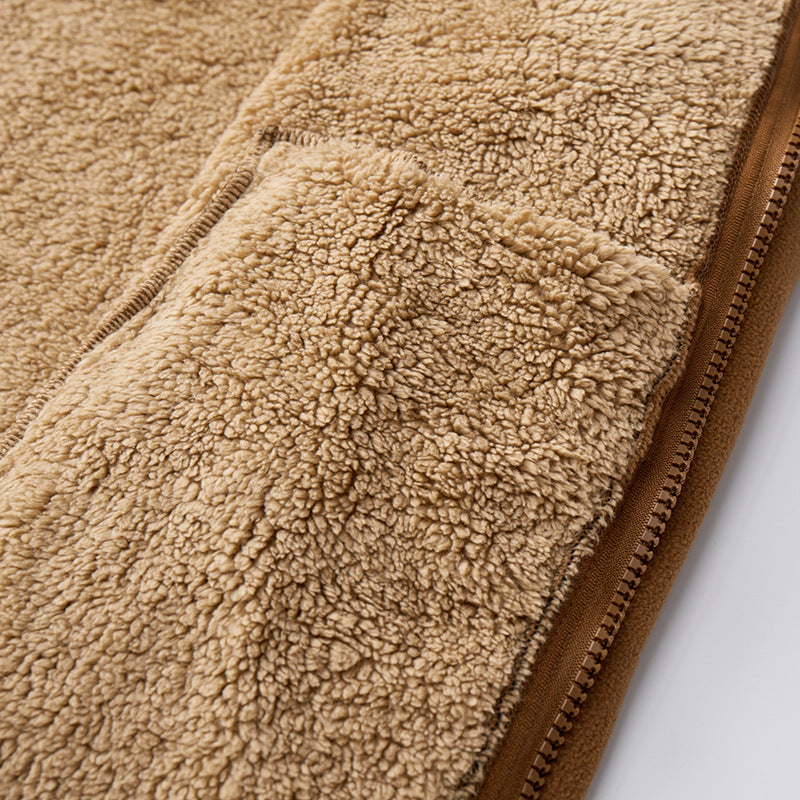 Tan polar fleece jacket featuring a plush, textured sherpa-lined interior and a sturdy zipper closure.