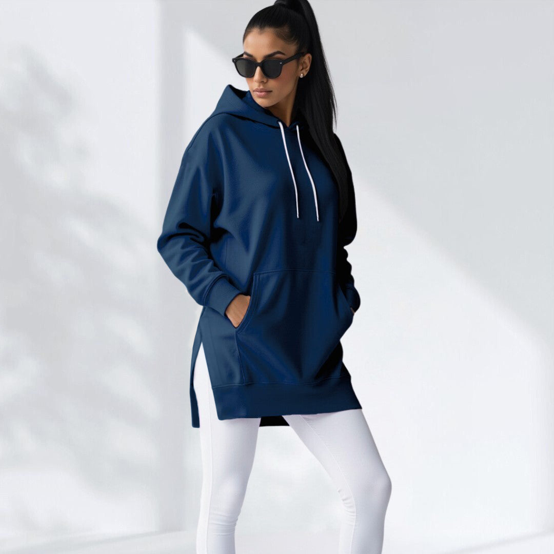 Oversized navy blue brushed cotton hoodie with a longline silhouette, side-slit hem, and drawstring hood.