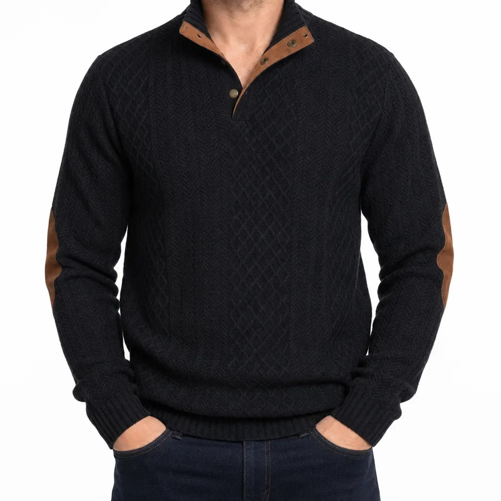 Black cable-knit henley sweater featuring a mock neck button placket and contrast brown elbow patches.