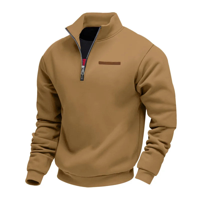 Brown half-zip fleece sweatshirt with a stand collar, ribbed cuffs, and chest accent detail on a white background.