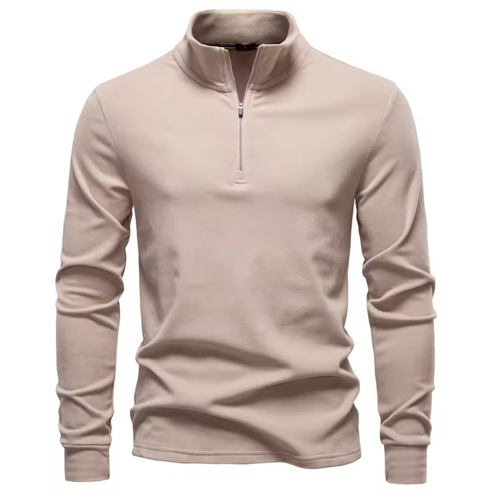 Beige brushed quarter-zip sweater with a matte finish, upright funnel collar, and a clean, straight-fit silhouette.