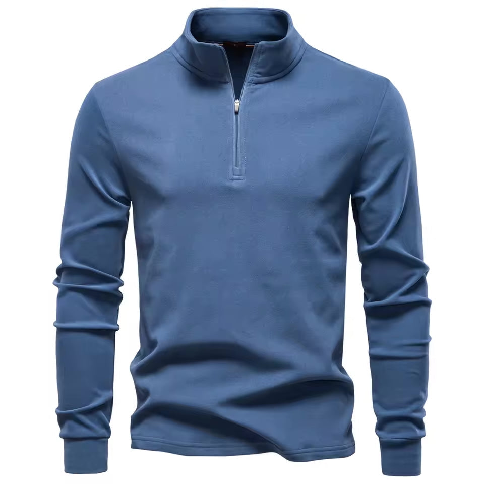 Blue brushed quarter-zip sweater with a matte finish, funnel collar, and a clean, straight-fit silhouette.