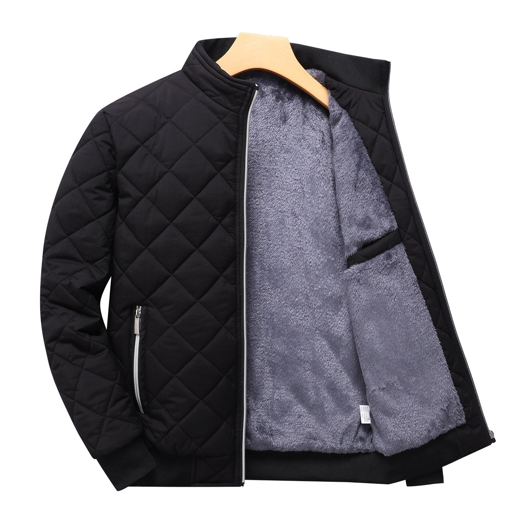 Black diamond-quilted zip-up jacket with a stand collar and soft grey fleece lining on a wooden hanger.