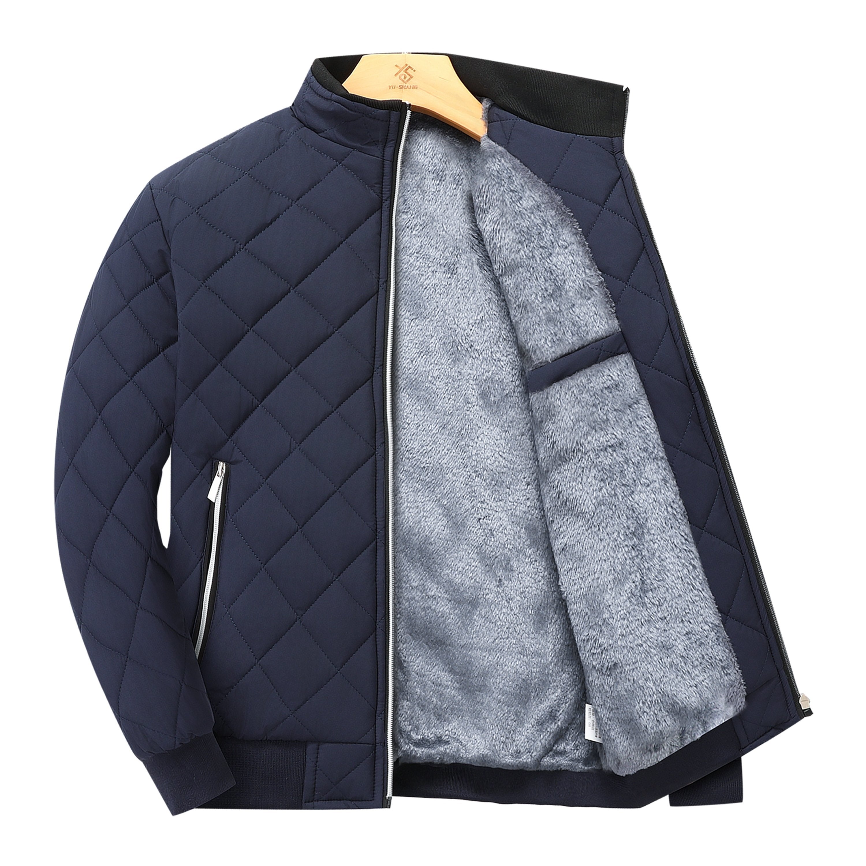 Navy diamond-quilted zip-up jacket with a ribbed stand collar and plush grey faux-fur lining on a hanger.
