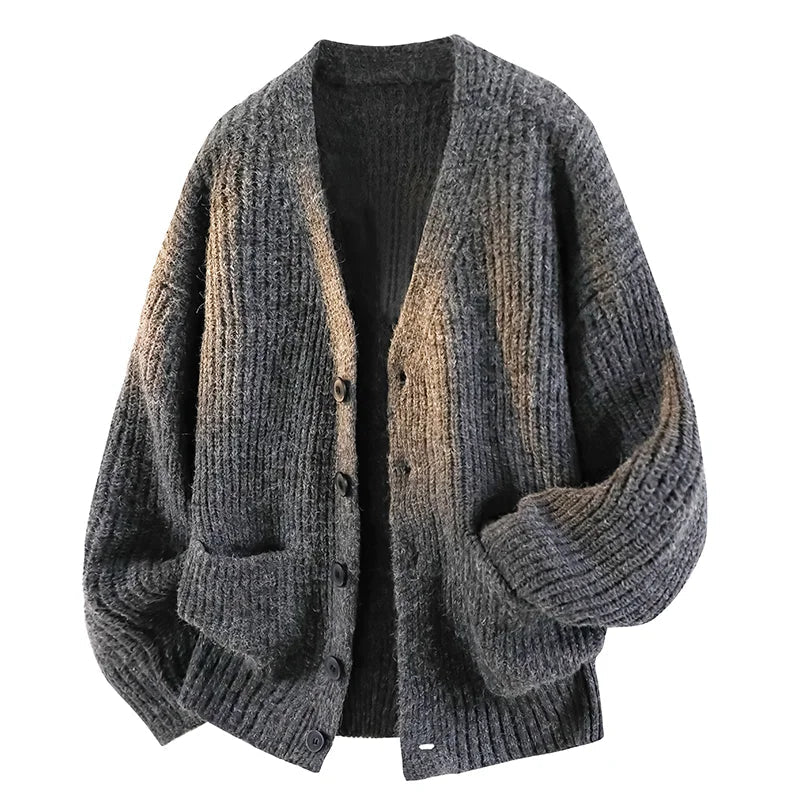 Dark gray oversized chunky knit cardigan with a fuzzy rib texture, V-neck, button front, and front patch pockets.