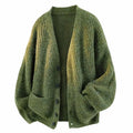 Oversized olive green chunky knit cardigan with a fuzzy rib texture, V-neck, button front, and front patch pockets.