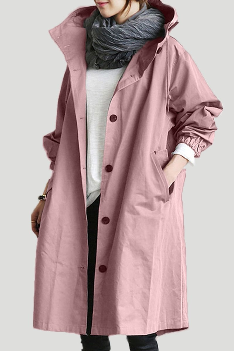 Dusty pink oversized hooded trench coat in lightweight fabric with a button-front placket and slant hip pockets.