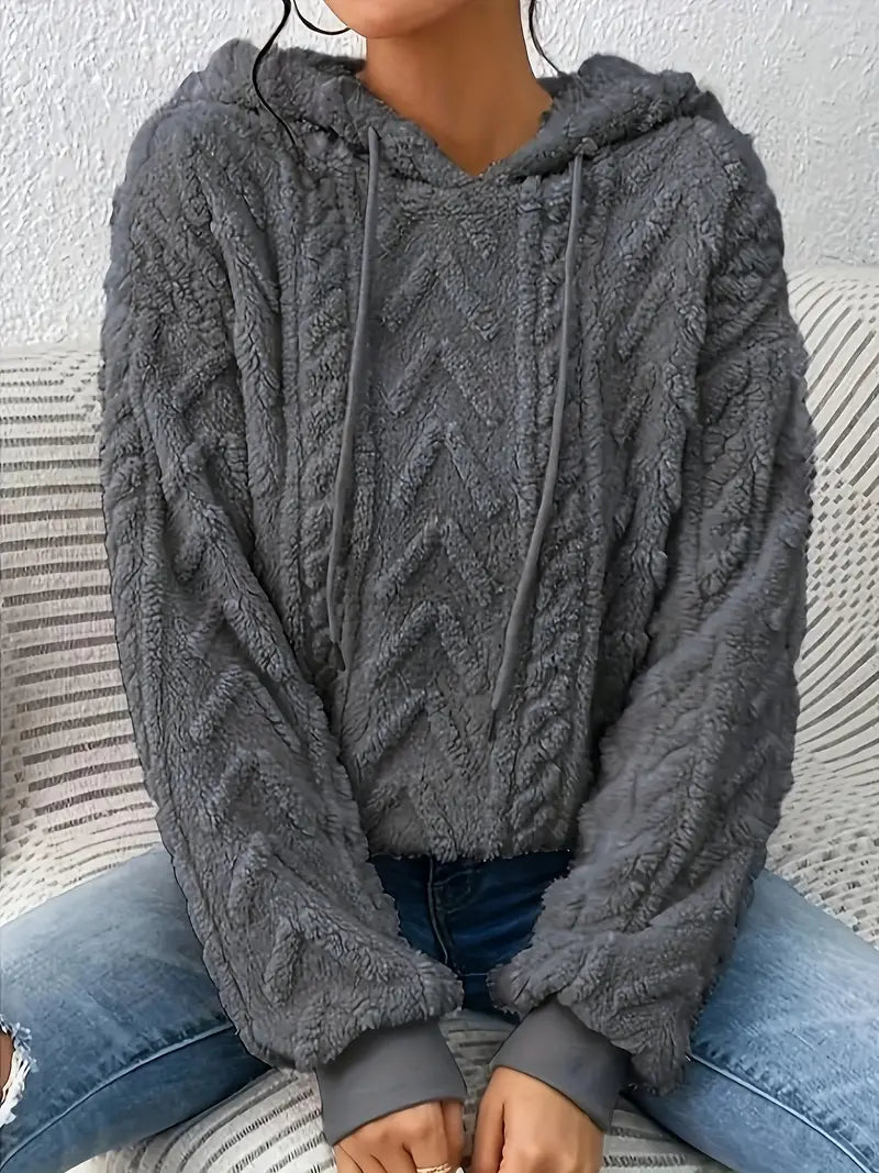 Oversized Plush Fleece Hoodie – Gray hoodie worn by a female model with raised chevron cable pattern