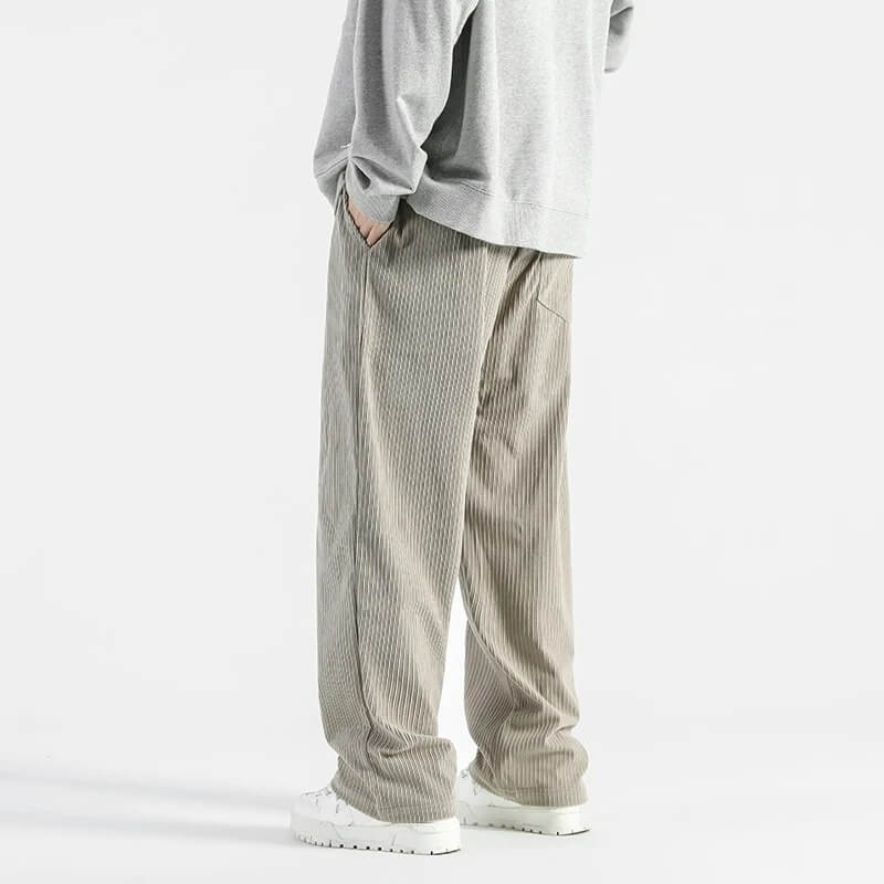 Light gray straight-leg corduroy pants with elastic waist and side pockets