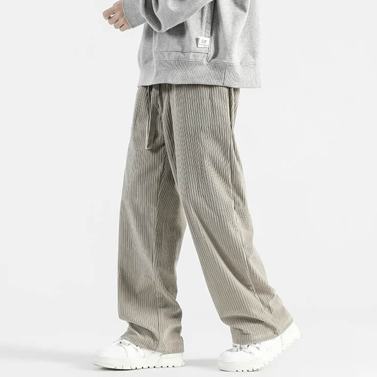 Light gray corduroy pants shown from the back with relaxed straight-leg fit