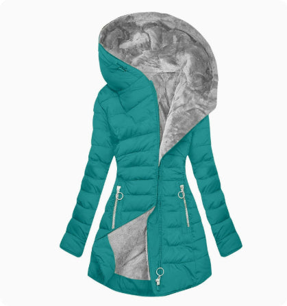 Teal Plush-Lined Hooded Puffer Coat shown from the front, featuring a plush-lined hood, asymmetric zip front, quilted panels, drawstring waist, and longline cut.