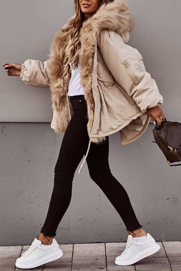 Beige  Plush-Trim Hooded Parka worn with black leggings, featuring a plush-trimmed hood, drawstring waist, zip sleeve pocket, and fitted silhouette.