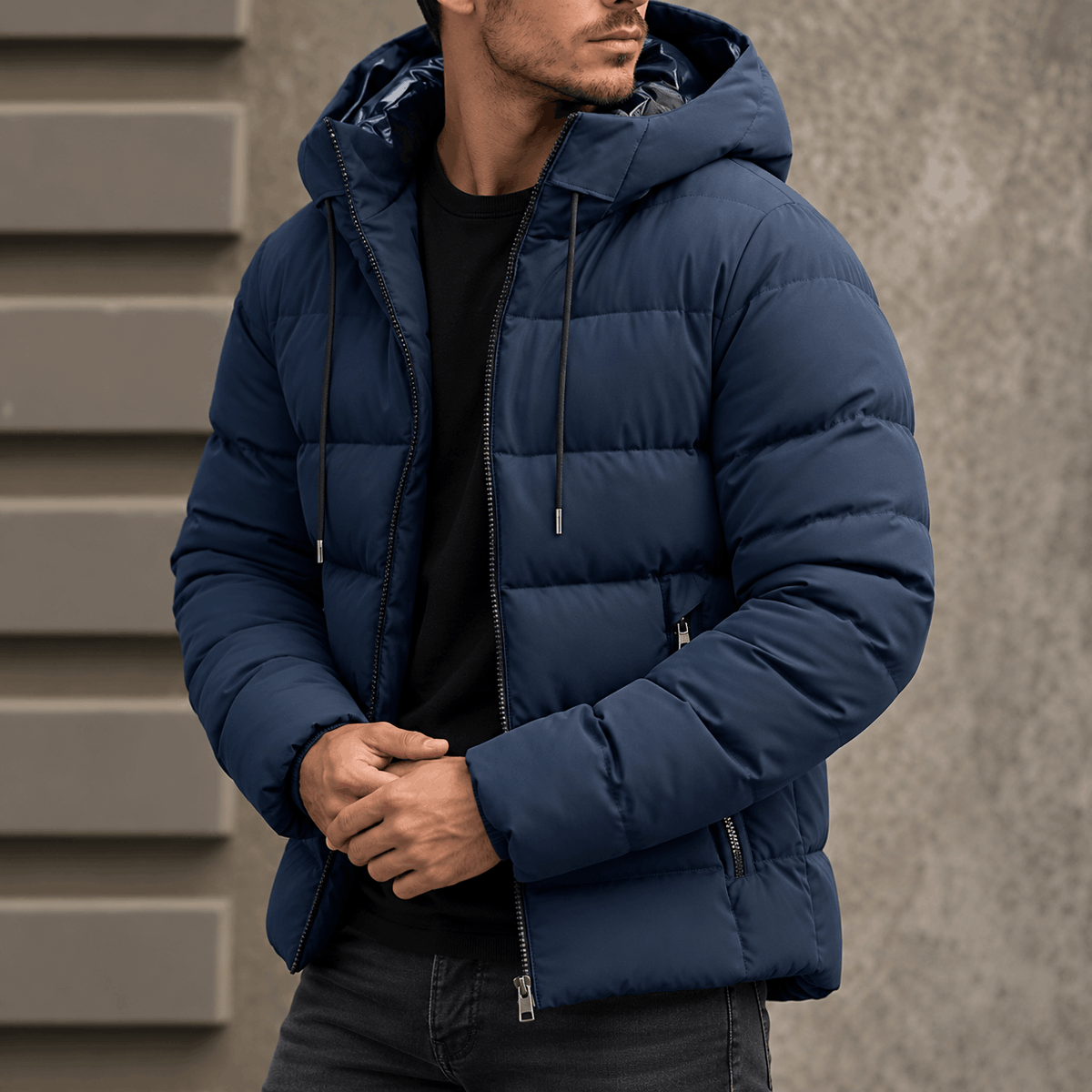 Navy blue quilted puffer jacket with a drawcord hood, vertical zip pockets, and a tailored hip-length fit.