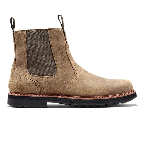 Tan suede Chelsea boot showing the elastic side panel, pull tab, stitched construction, and textured rubber sole.