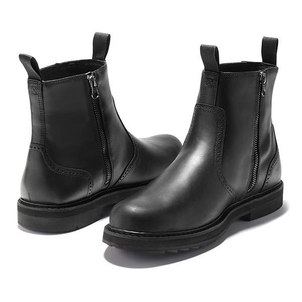 Pair of black Chelsea boots displayed together, showing the elastic panels and pull tabs.
