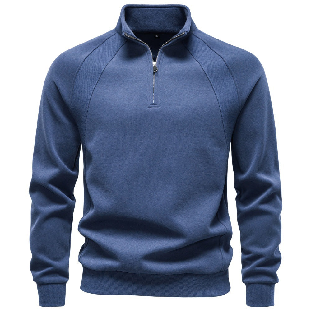 Blue raglan quarter-zip sweatshirt with a stand collar shown from the front.