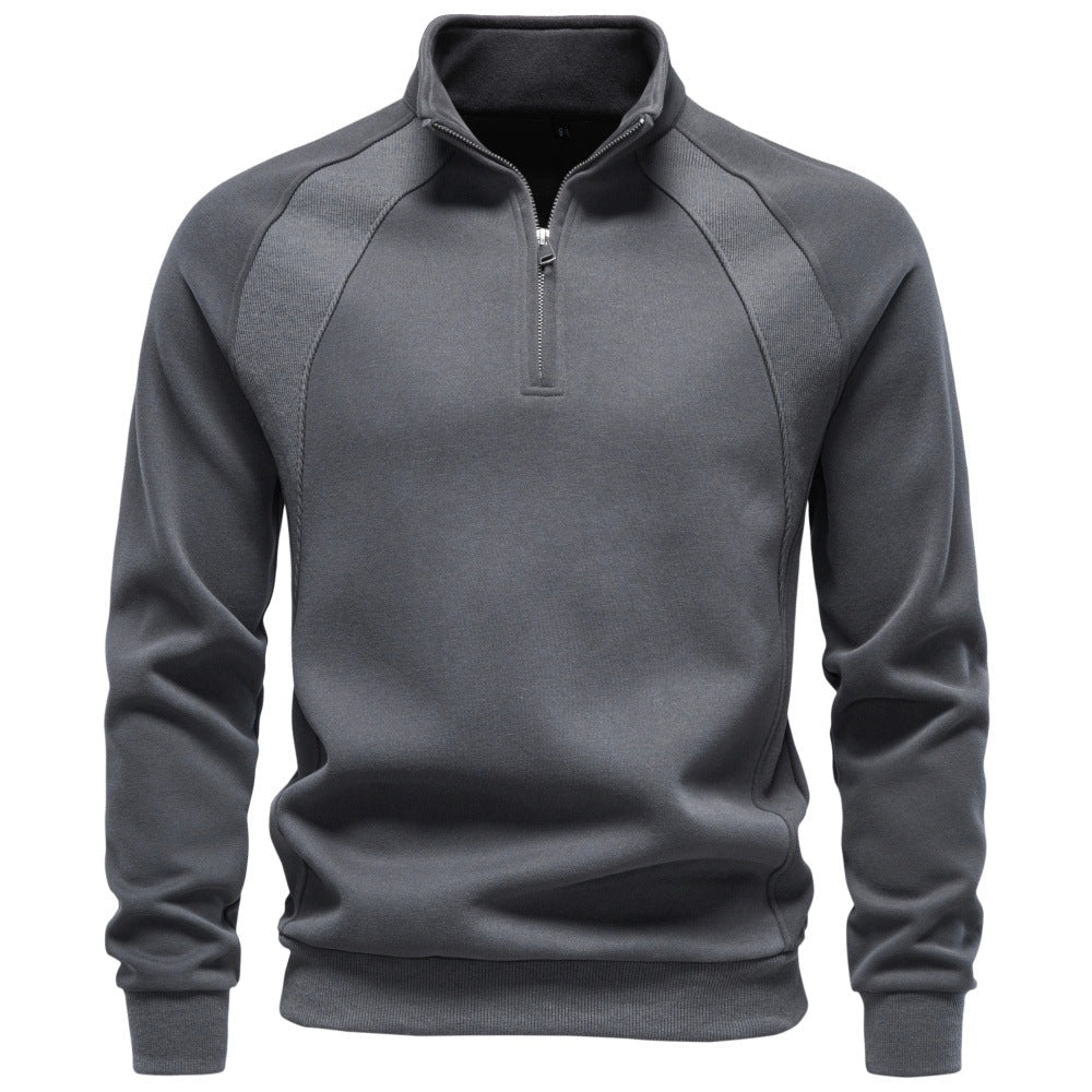 Charcoal gray raglan quarter-zip sweatshirt with a stand collar shown from the front.