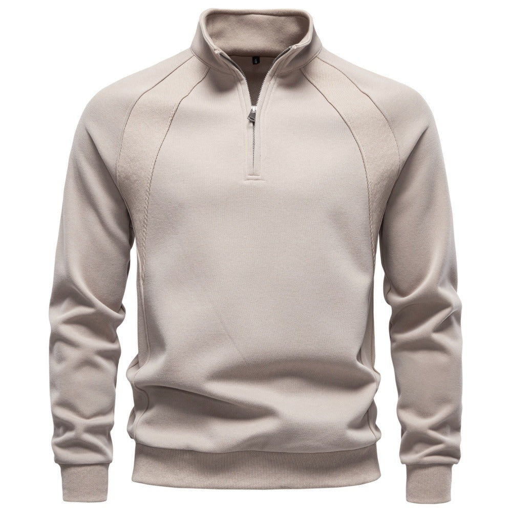 Beige raglan quarter-zip sweatshirt shown from the front on a mannequin.