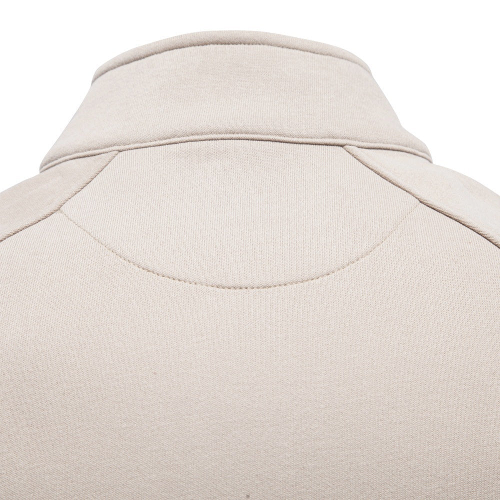 Close-up of the sweatshirt’s stand collar and upper back seam.
