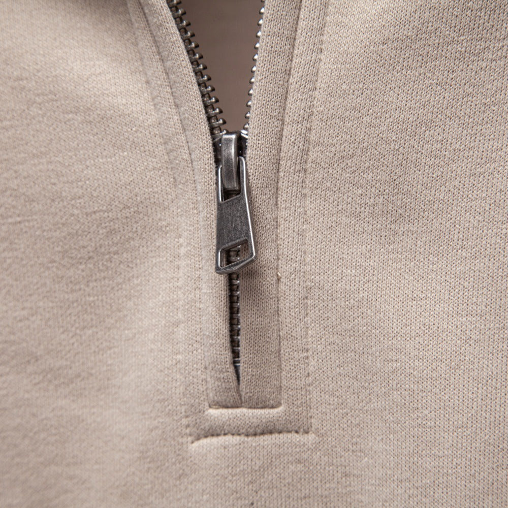 Close-up of the quarter-zip collar and zipper detail.