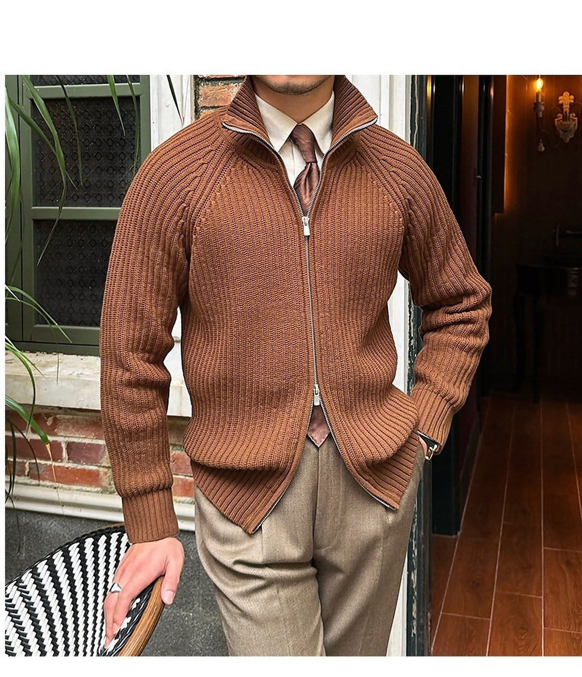 Brown linen-blend knit cardigan with a full-zip front, ribbed stand collar, and relaxed fit layered over a collared shirt.