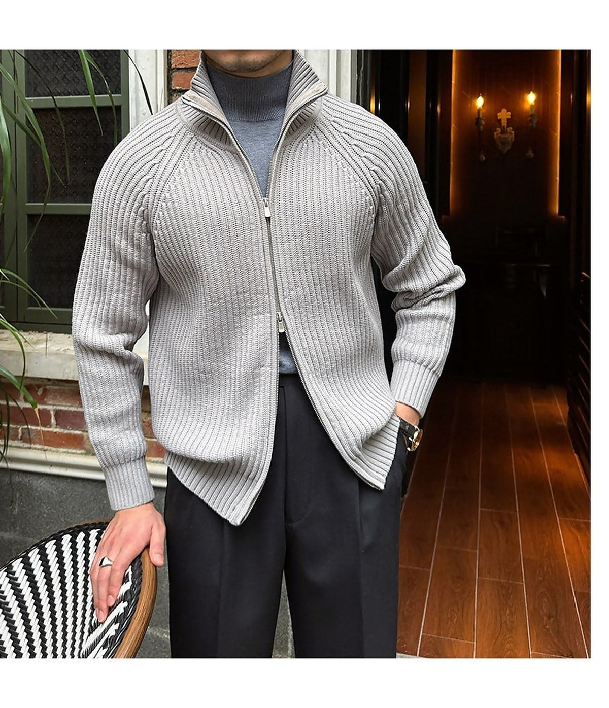 Light gray linen-blend knit cardigan with a full-zip front, ribbed trim, and relaxed fit layered over a mock-neck shirt.